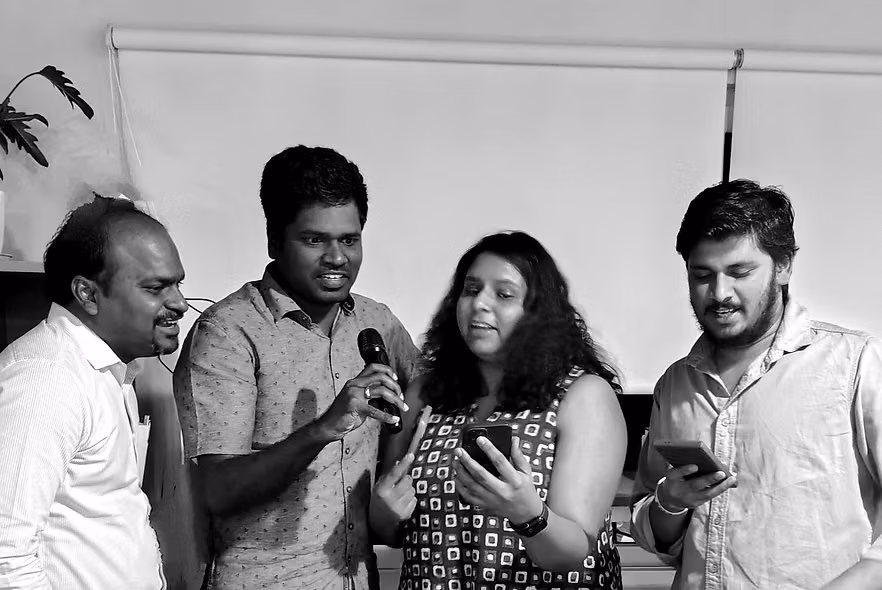 Sanlayan team members at an office event