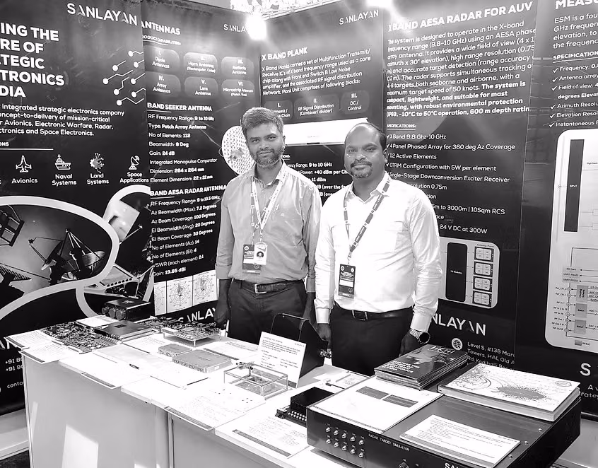 Sanlayan engineers at an exhibition booth